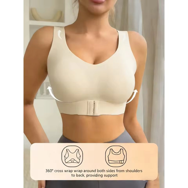 Woman wearing a beige sports bra with text indicating support features.